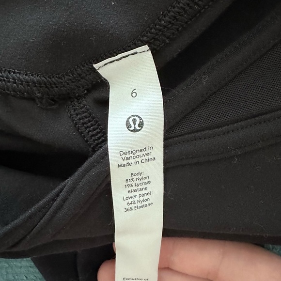 Lululemon black nulu and crisscross mesh stirrup tight leggings size 6 - Picture 9 of 10